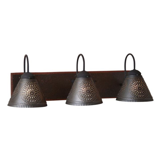 Three light Crestwood Vanity Light in Espresso with Salem Brick, featuring a hand-painted, distressed wooden back with black textured arms and crimped pans, with kettle black shade finish.