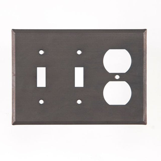A double switch and outlet cover with a matte black finish and a rustic design, featuring two switch cutouts and two outlet covers on a rectangular tin plate.