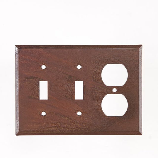 A double switch and outlet cover with a rustic tin finish, featuring a matte lacquer protective coating.