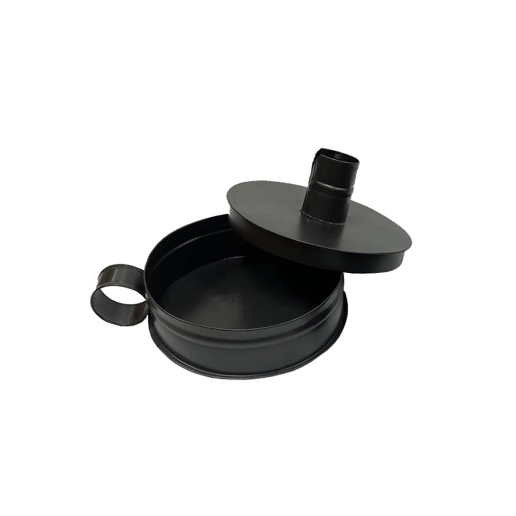 Black round tinder box candle holder with a loop handle and lifted lid showing the storage compartment.