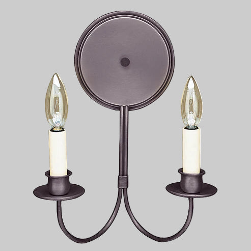 Wall sconce with two candle-style light fixtures on a gray background