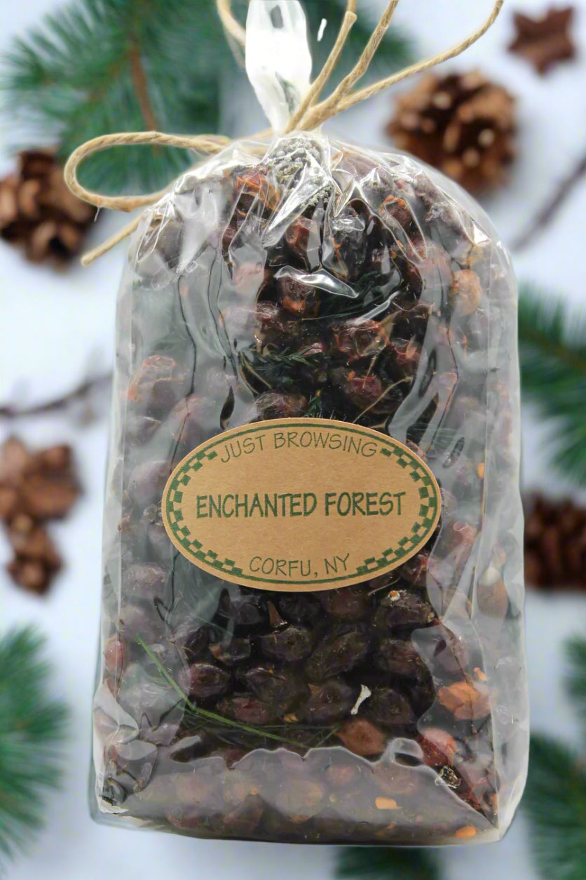 Bag of dried flowers labeled 'Enchanted Forest' with a visible brand name on a white background