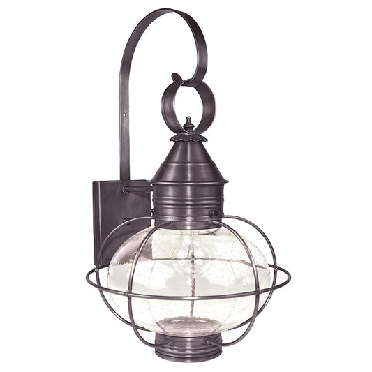 Outdoor wall light fixture with glass shade on a white background