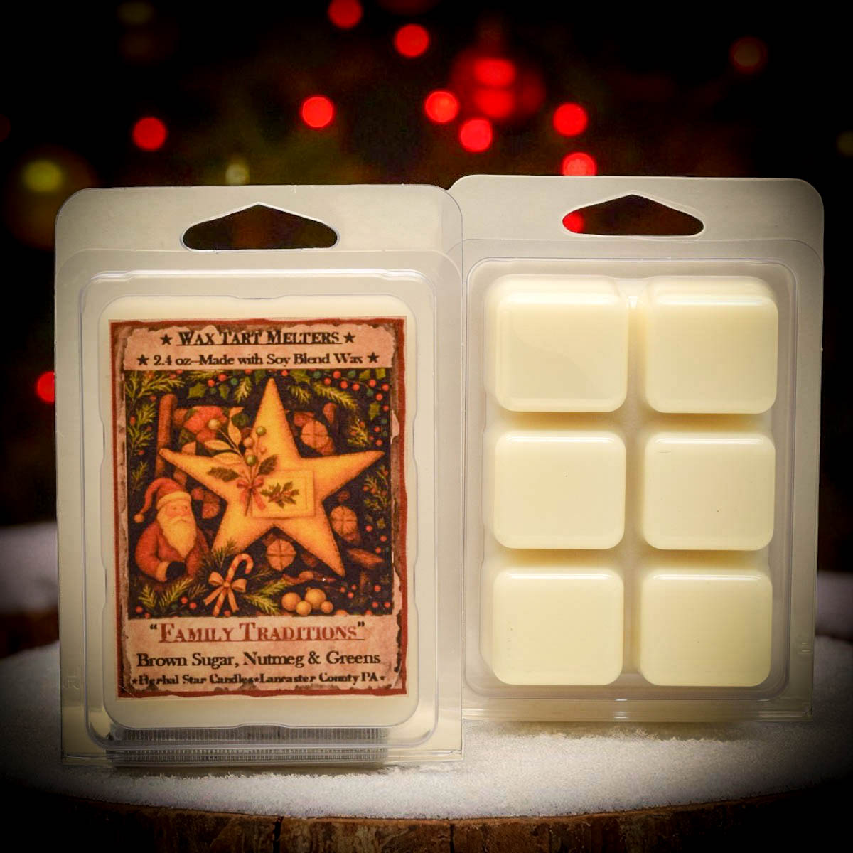 Wax tart melt package with star design and 'Family Traditions' label on a dark background.