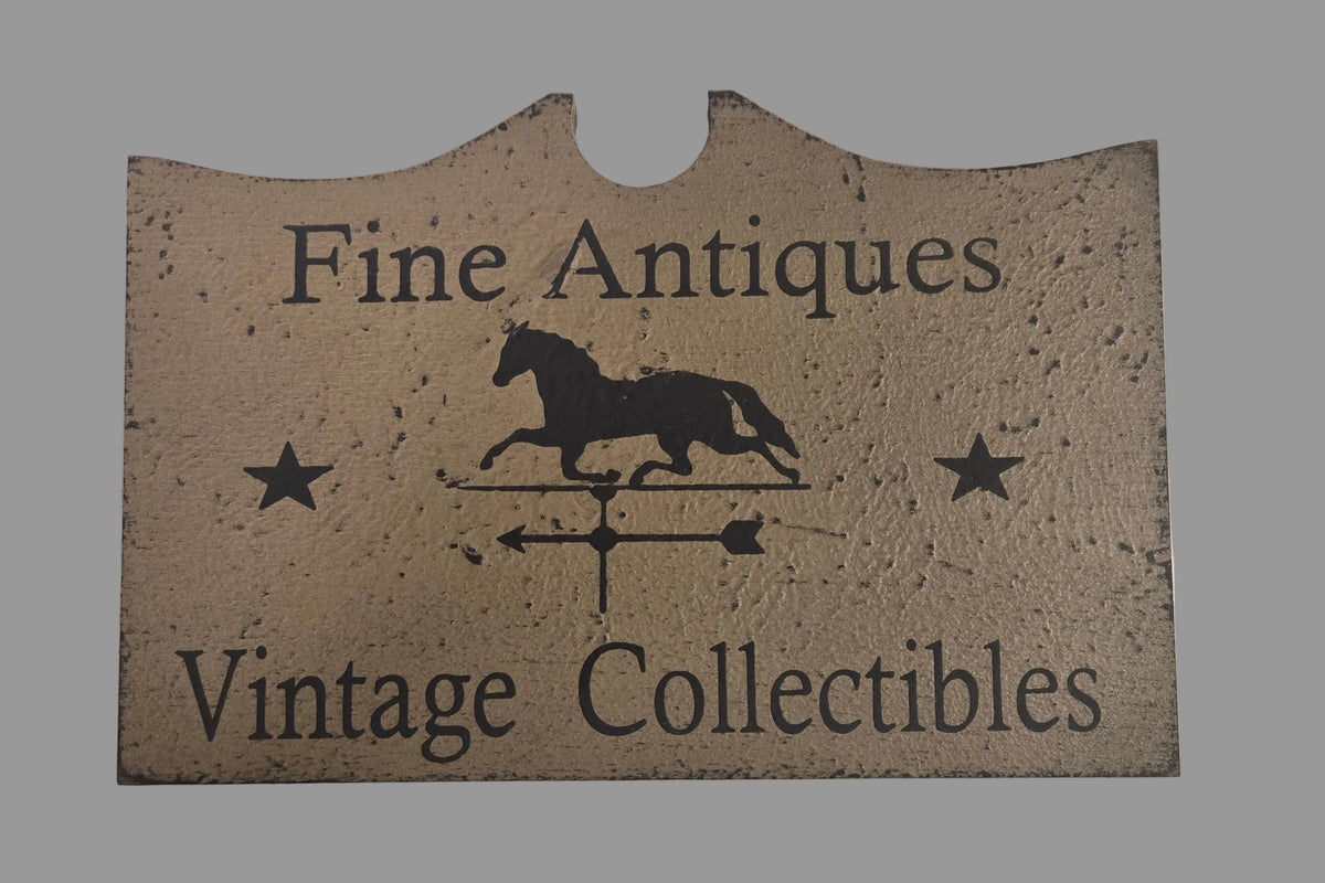 Decorative sign with 'Fine Antiques' and 'Vintage Collectibles' text and a horse silhouette.