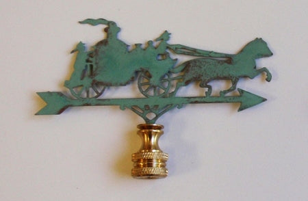 A verdigris lamp finial designed as a fire wagon, with a green patina finish and a gold-colored base.
