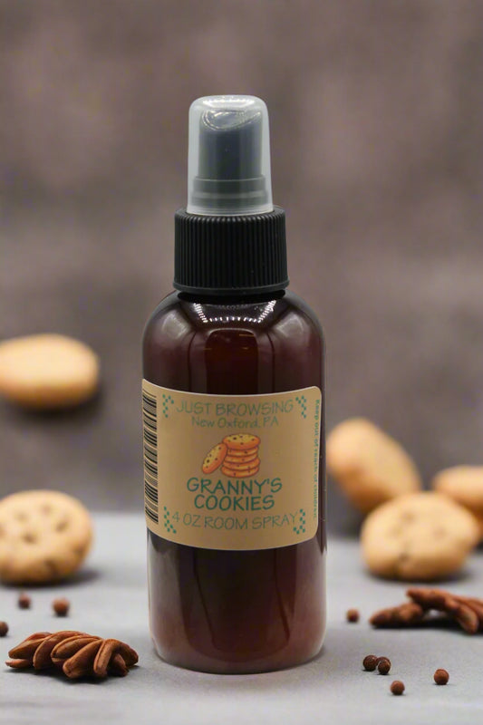 A 4oz bottle of Granny's Cookies room spray with a mist spray top. The label features the product name and a brief description.