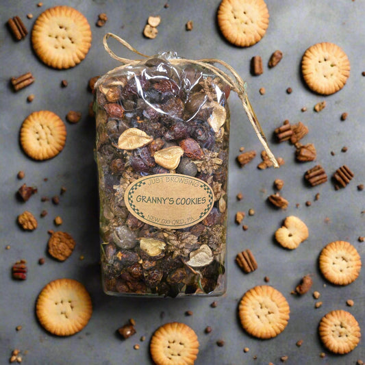 Bag of potpourri surrounded by cookies and spices
