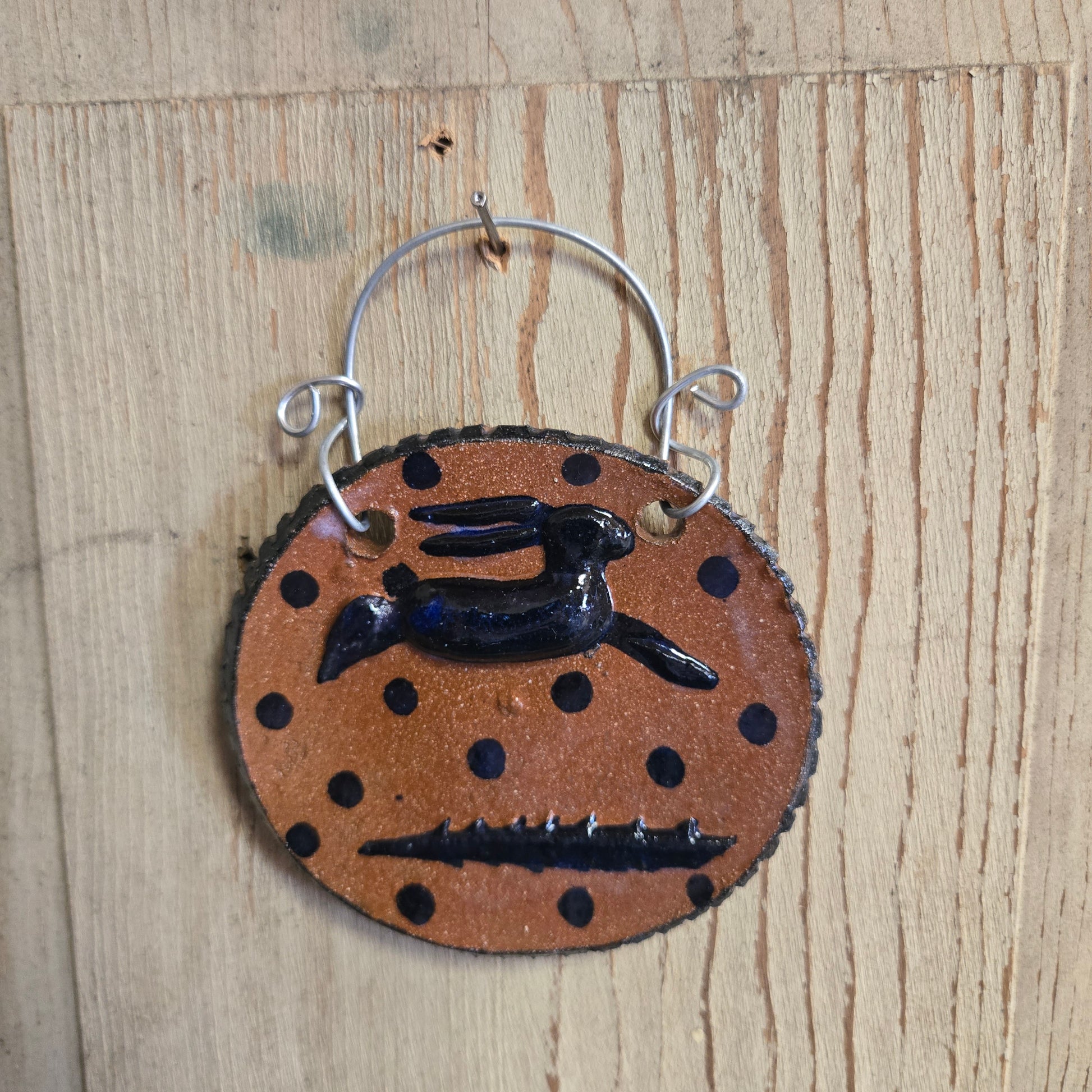 Hanging bunny ornament made of stoneware