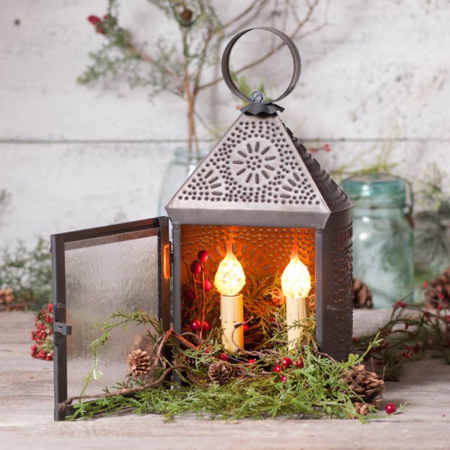 Punched tin lantern with open door with two silicone bulbs.