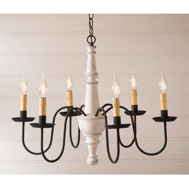Chandelier with six candle-style lights on a neutral background