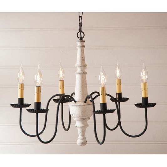 Chandelier with six candle-style lights on a neutral background