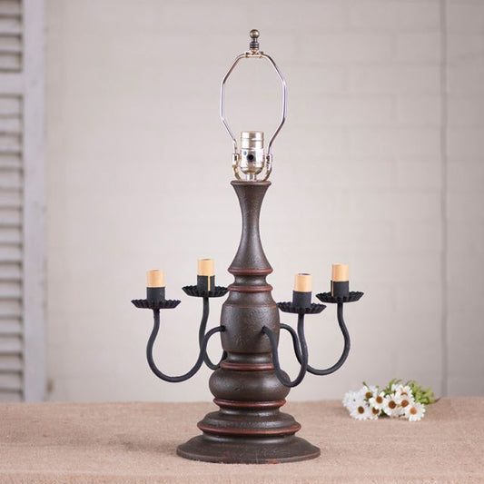Wooden lamp base with four sockets in espresso paint with white background