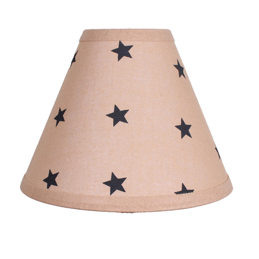 Beige lampshade with black star patterns on a white background