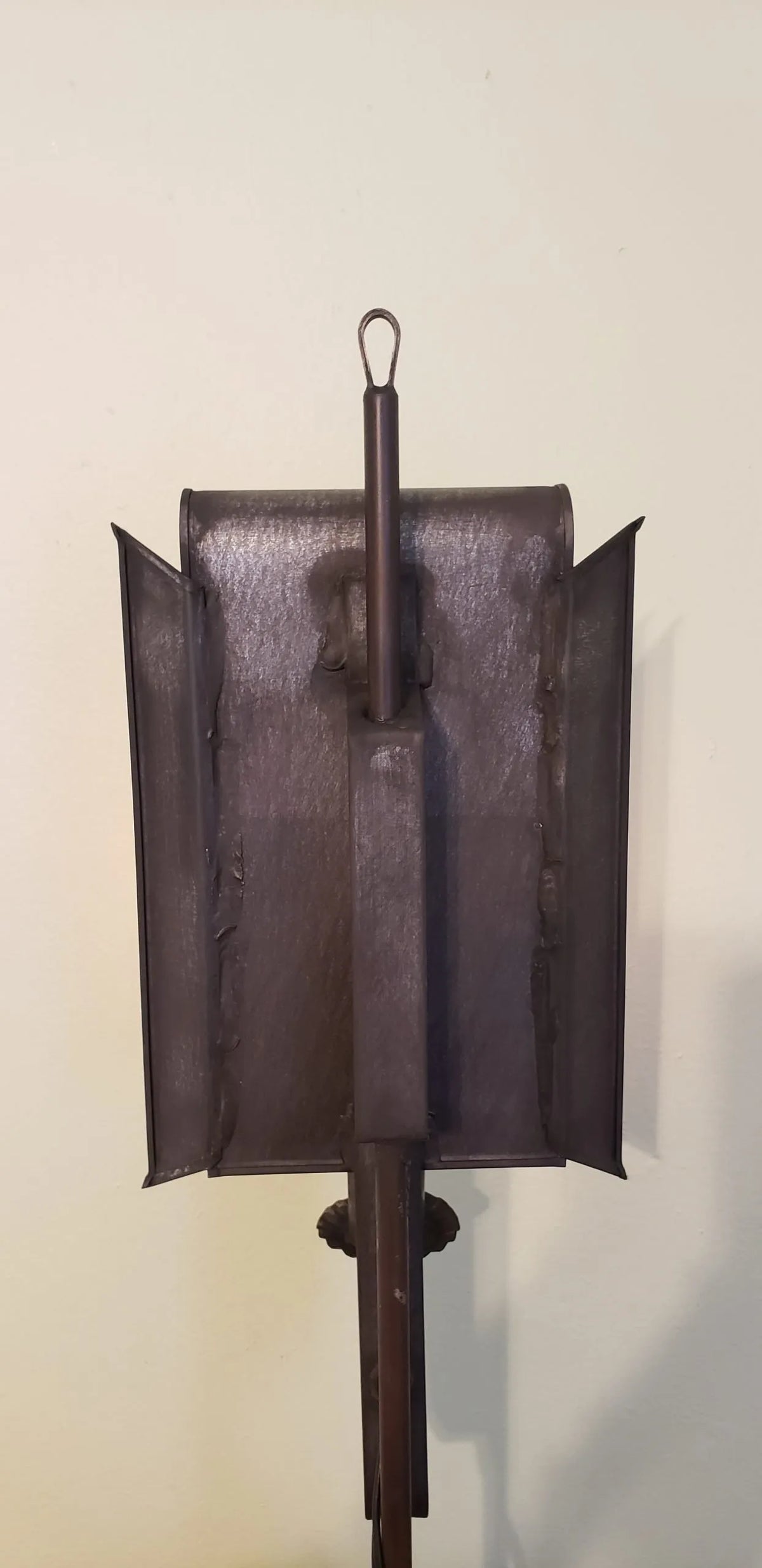 Back view of tin table lamp.