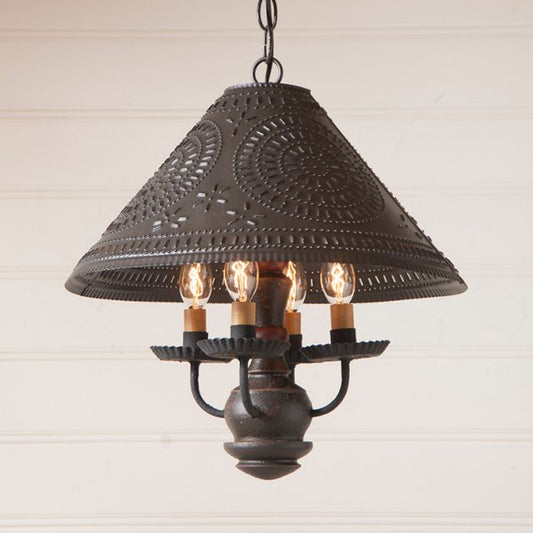 Primitive hanging light with punched tin shade in chisel with four candelabra bulbs