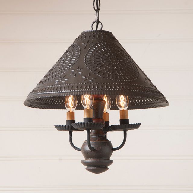 Vintage-style pendant light with intricate design on a neutral background