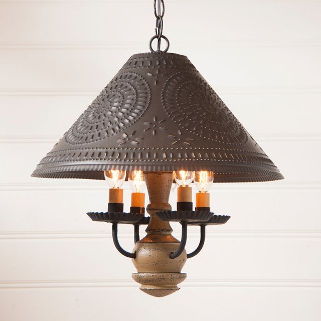 Decorative chandelier with textured metal shade and ceramic base on a white background