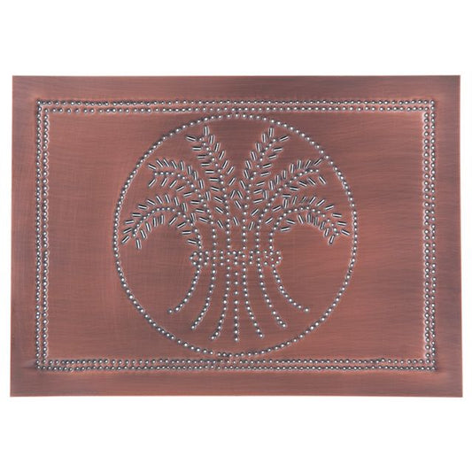 A solid copper panel with a pierced horizontal wheat design and  antique finish