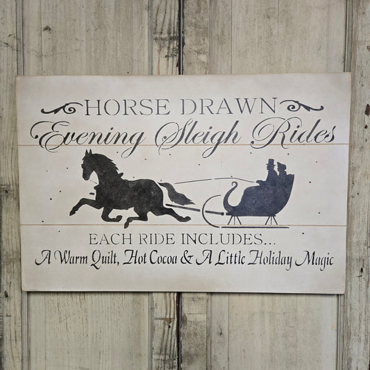 Weathered sign with horse and sleigh with some text