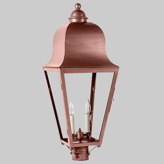 Copper outdoor lantern with gray glass on a white background