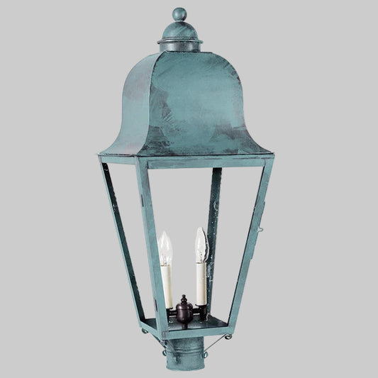 Vintage-style outdoor lamp with clear glass on a gray background