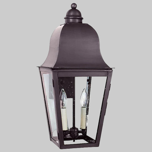 Traditional outdoor wall light fixture on a gray background