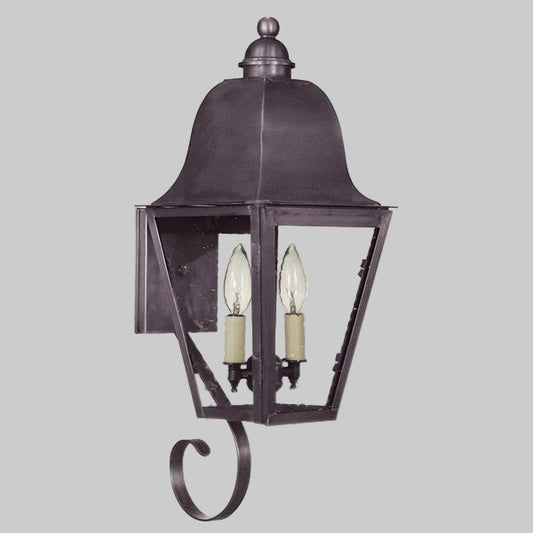 Decorative outdoor wall light fixture on a gray background