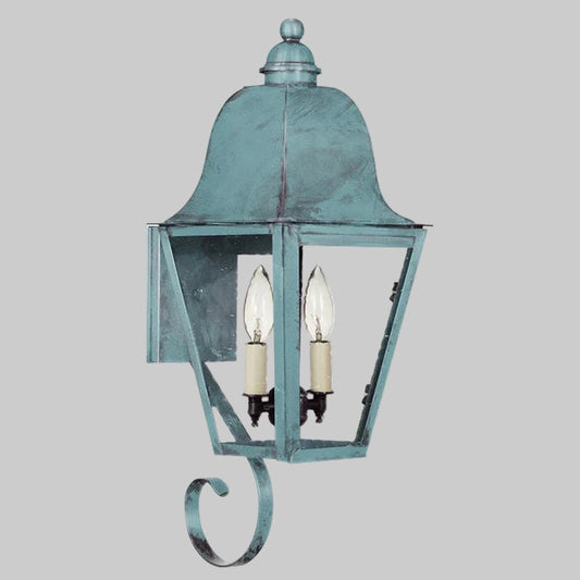 Vintage-style wall lantern with a weathered blue finish on a gray background