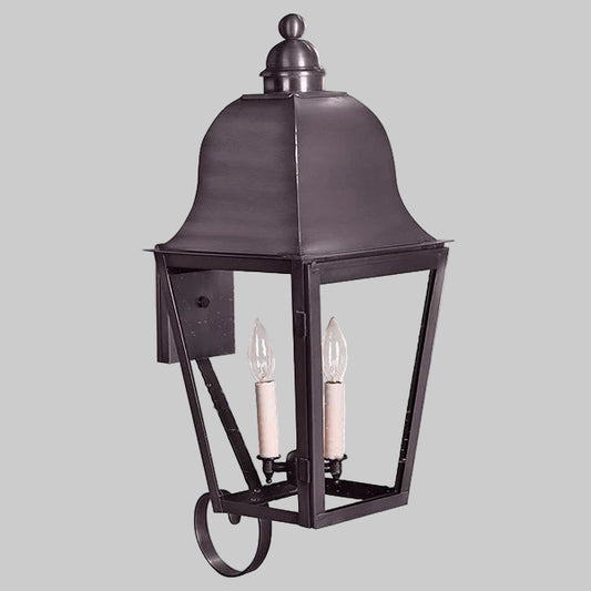 Decorative outdoor wall light fixture on a gray background