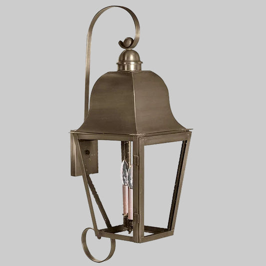 Bronze outdoor wall lantern on a gray background