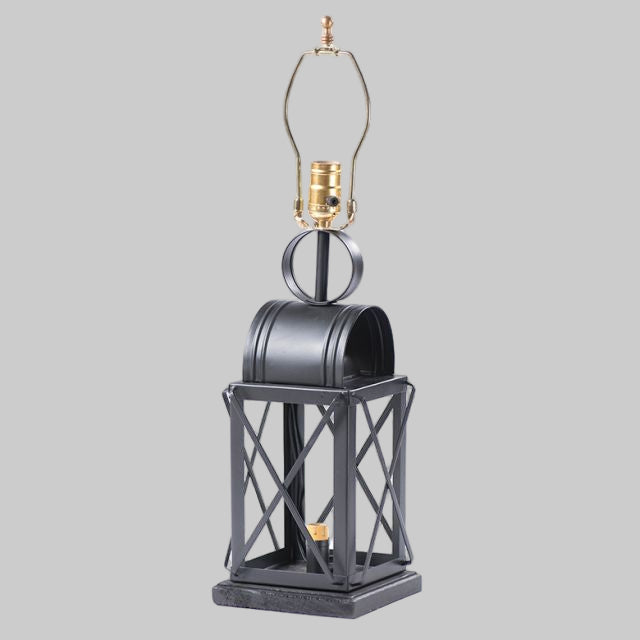 Tin lamp base with cross bars on white background