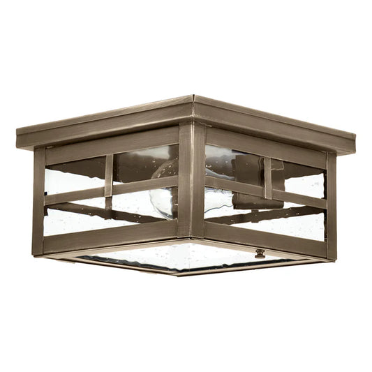 Square outdoor ceiling light fixture with glass panels on a white background
