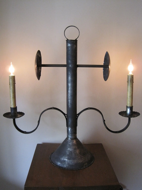 A Large 2 Arm Whaler Tin Table Light with a metal base and two lights.