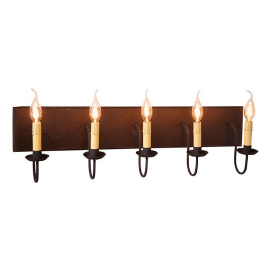 A black five-light vanity light fixture with textured arms and a red painted body, featuring E12/Candelabra sockets.