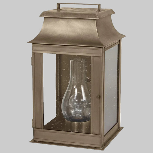 Bronze lantern with clear glass on a white background