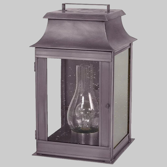 Decorative lantern with glass insert on a white background