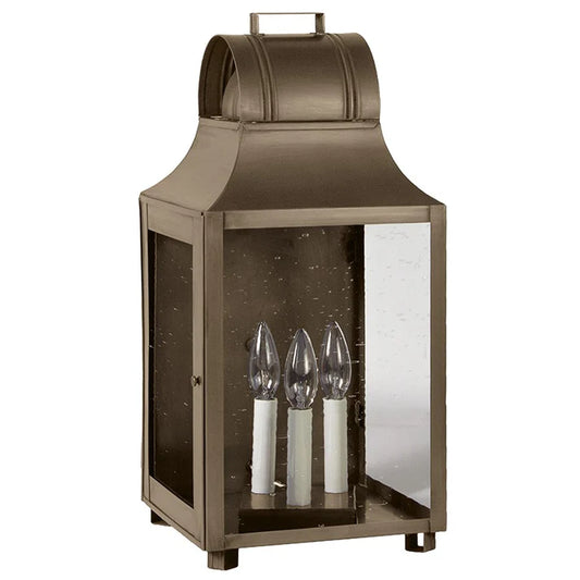 Bronze lantern with glass panels on a white background