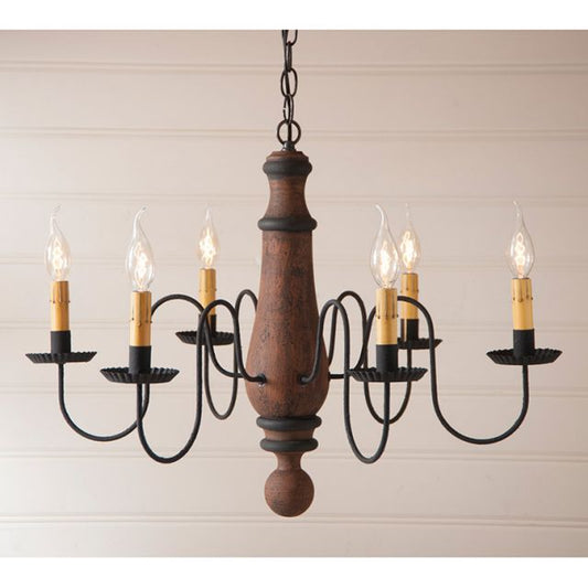 Wooden chandelier with six candle-style lights on a beige background