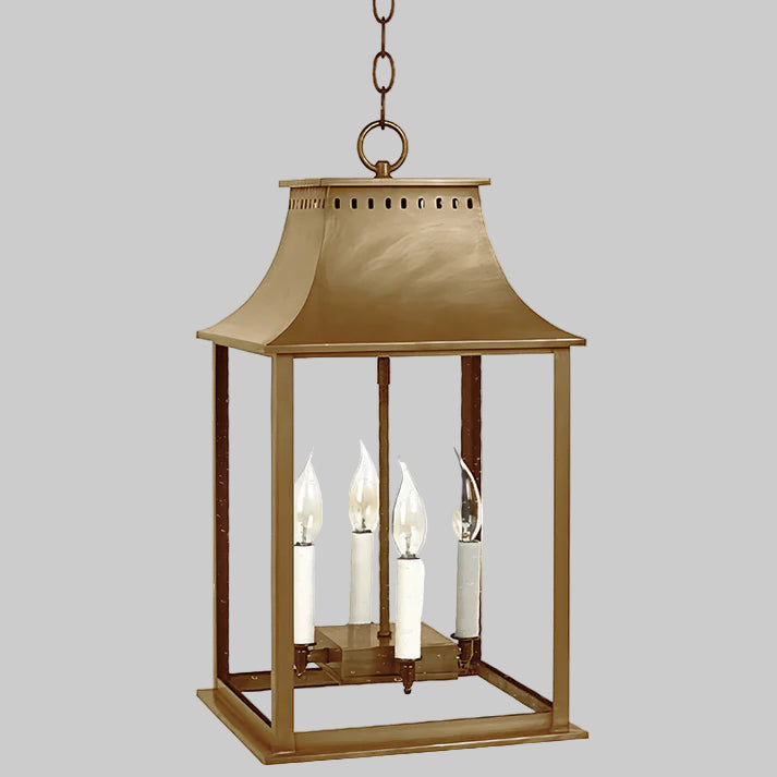 Bronze lantern with glass panels on a white background