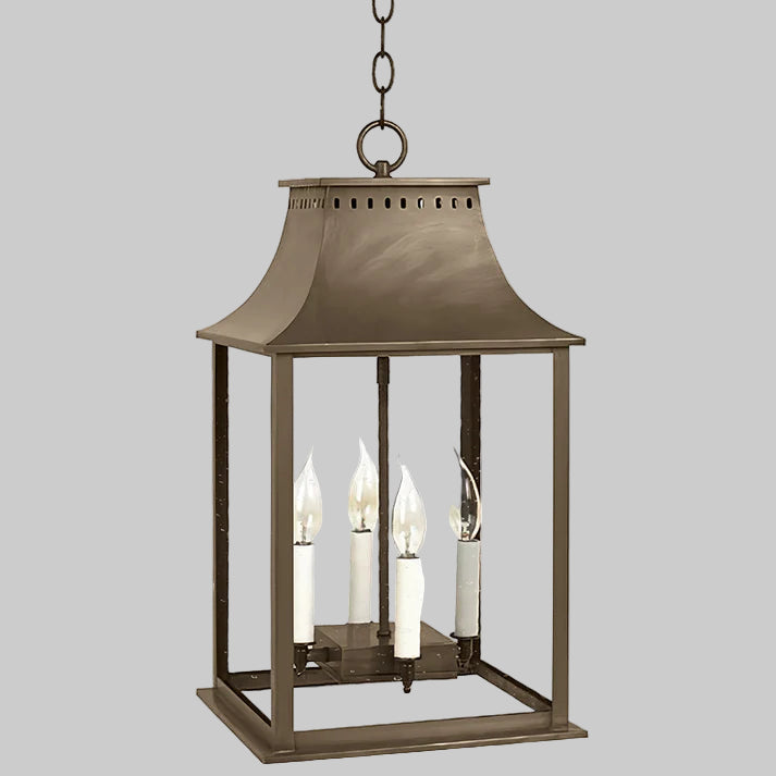Bronze hanging lantern with clear glass on a white background