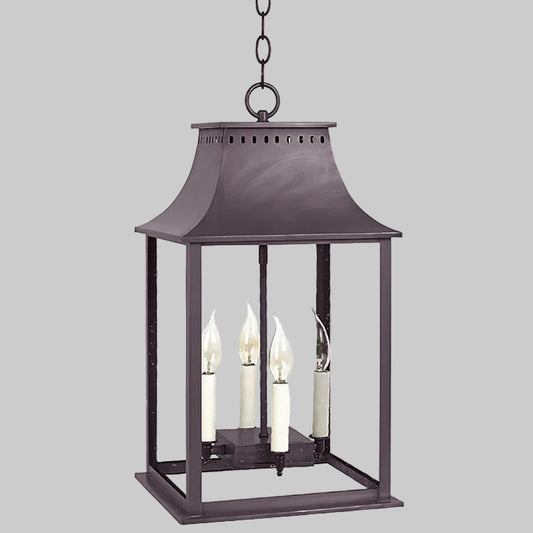 Decorative hanging lantern with three candle-like lights on a white background