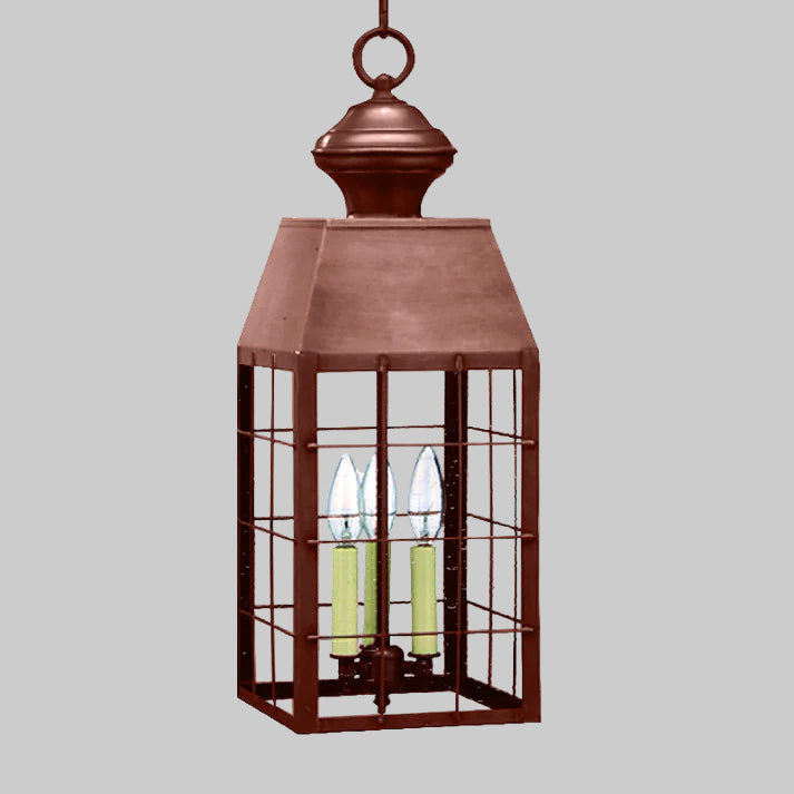 Bronze lantern with glass panels on a white background