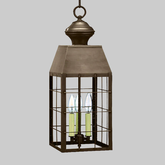 Bronze lantern with glass panels on a white background