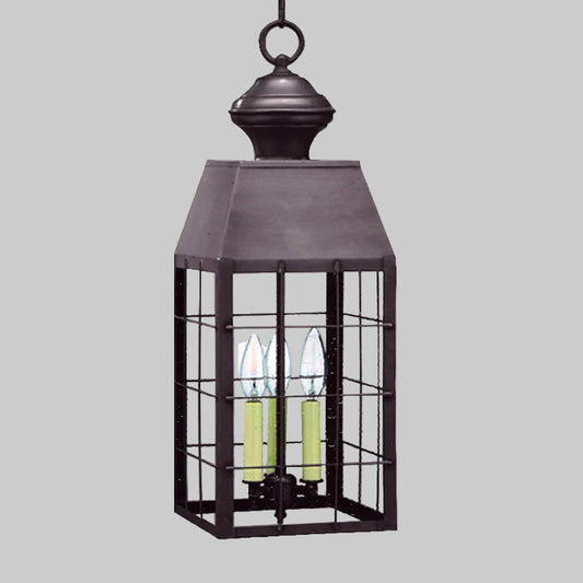 Decorative outdoor lantern with glass panels on a white background