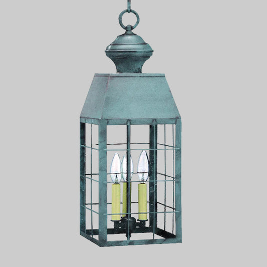 Decorative outdoor lantern with glass panels on a white background