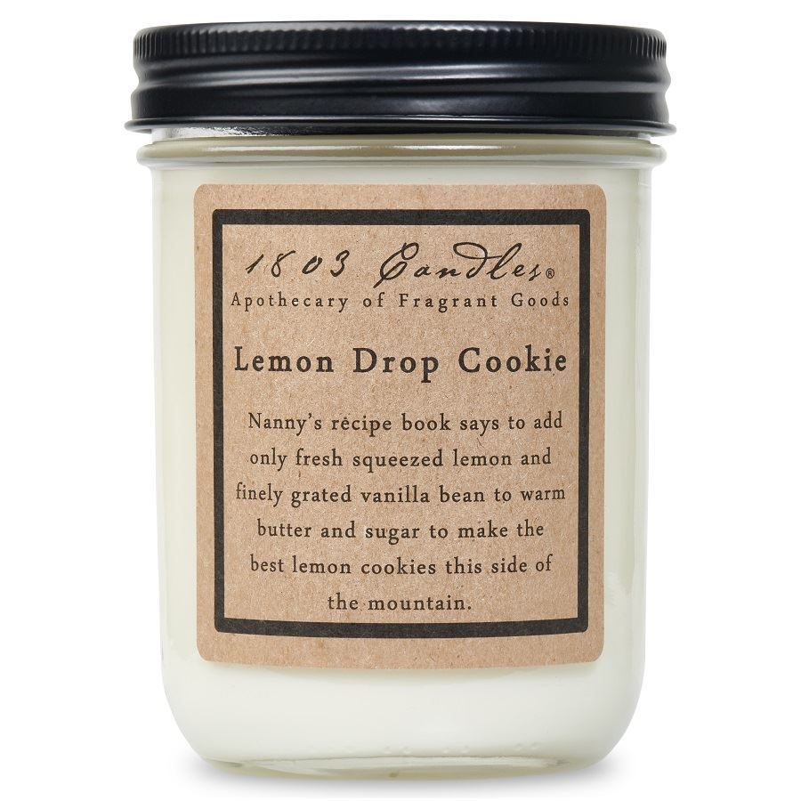 Candle jar labeled 'Lemon Drop Cookie' with a black lid on a white background