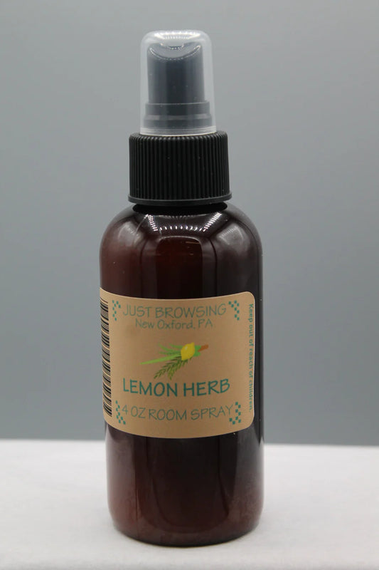 A 4oz bottle of Lemon Herb Room Spray with a mist spray top, labeled as 'Just Browsing' brand product.