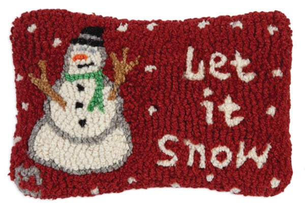 Rectangular pillow with red background and a white snowman with the words "Let It Snow"