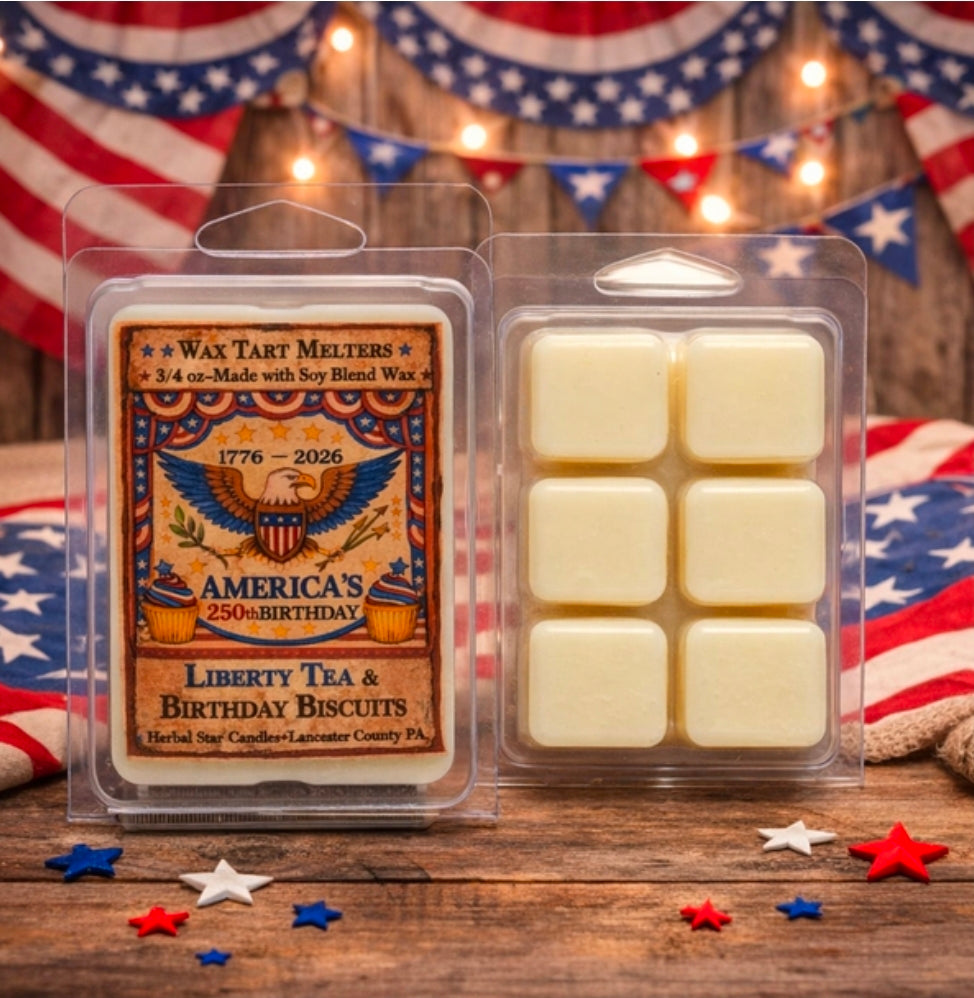 Wax tart melt packages with a patriotic theme on a wooden surface with American flag decorations.